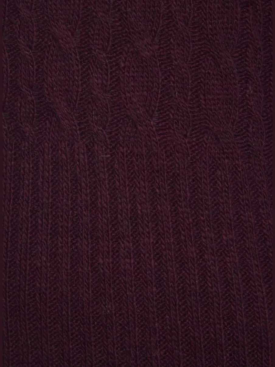 Robe en tricot col montant avec manches longues et jupe fendue