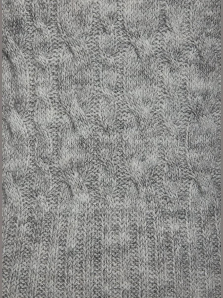 Robe en tricot col montant avec manches longues et jupe fendue