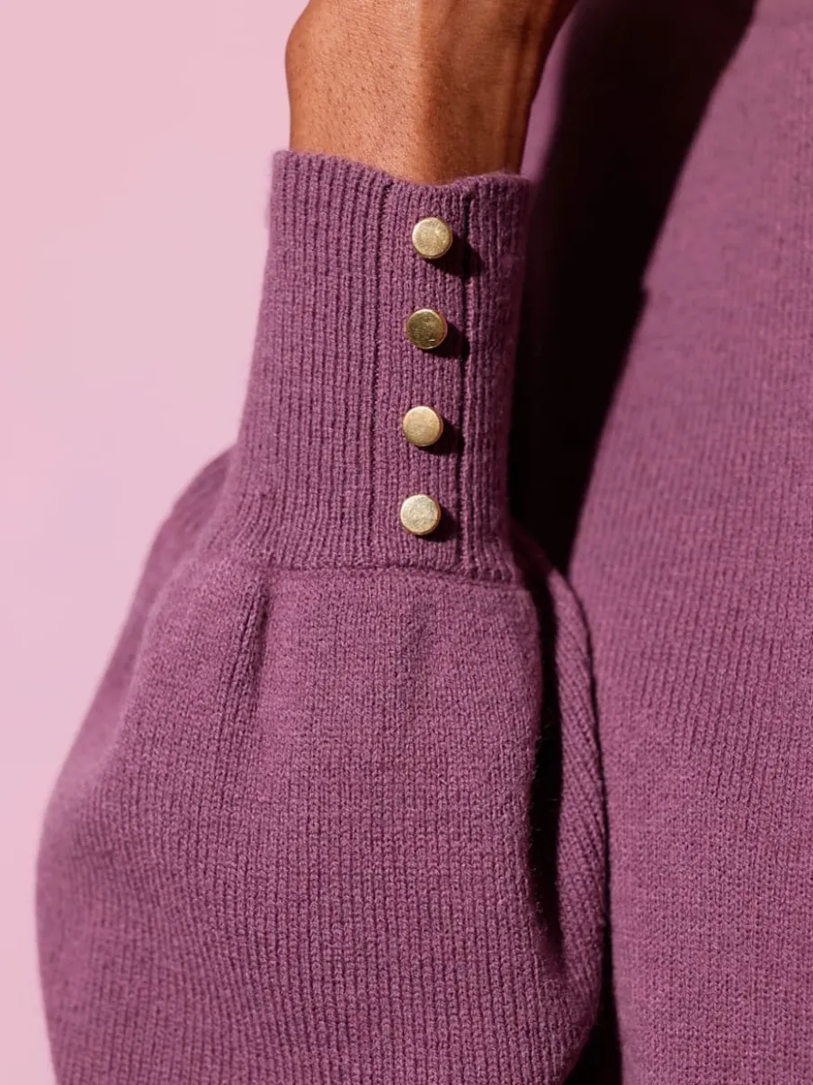Robe en tricot à manches ballon avec ceinture intégrée