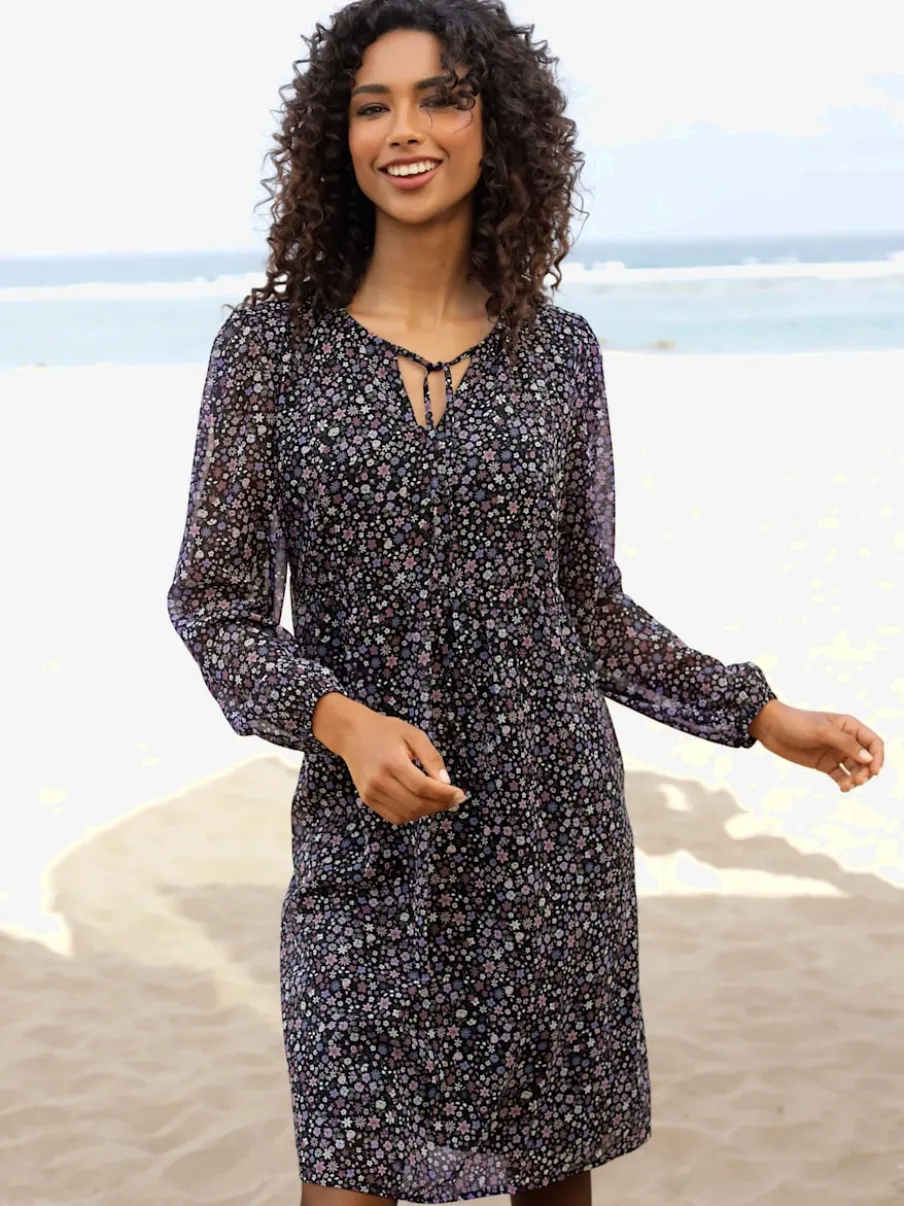 Robe à fleurs fluide avec encolure en V et fronces