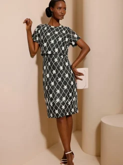 Robe fourreau à motifs losanges et fleurs légers