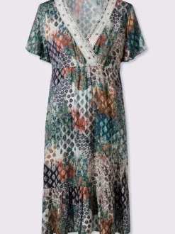 Robe imprimée à col en V avec manches courtes et ourlet volanté