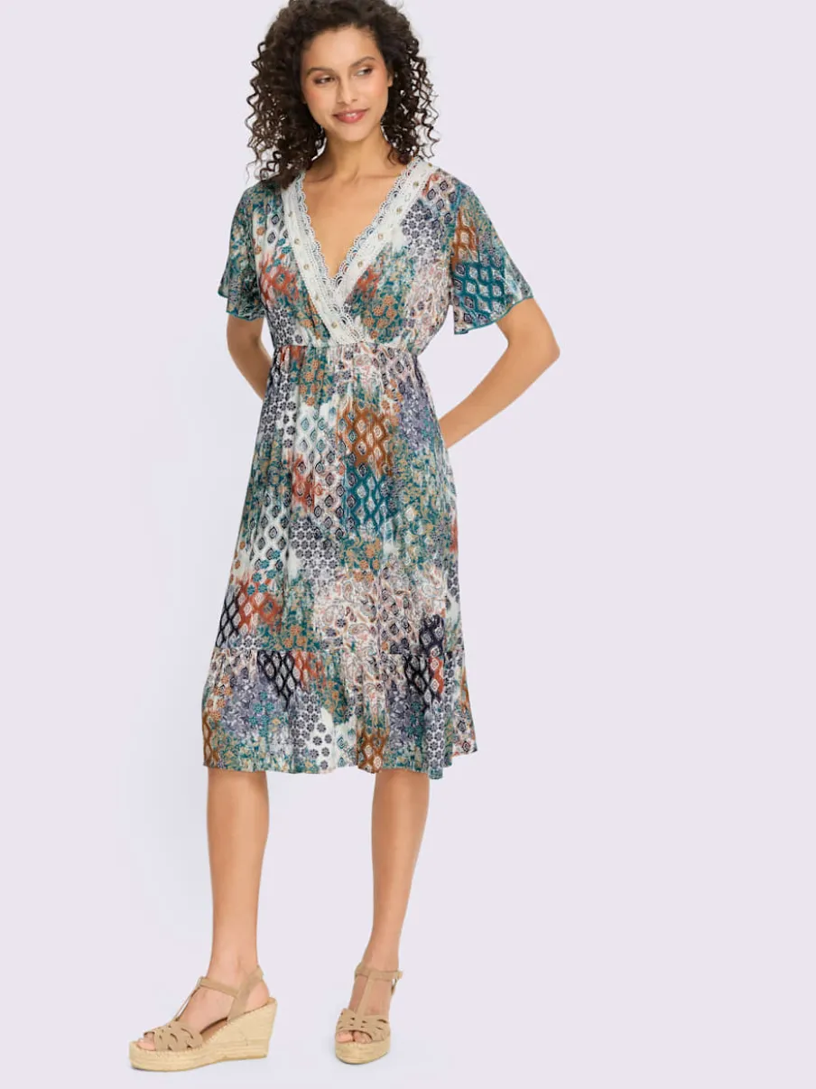 Robe imprimée à col en V avec manches courtes et ourlet volanté
