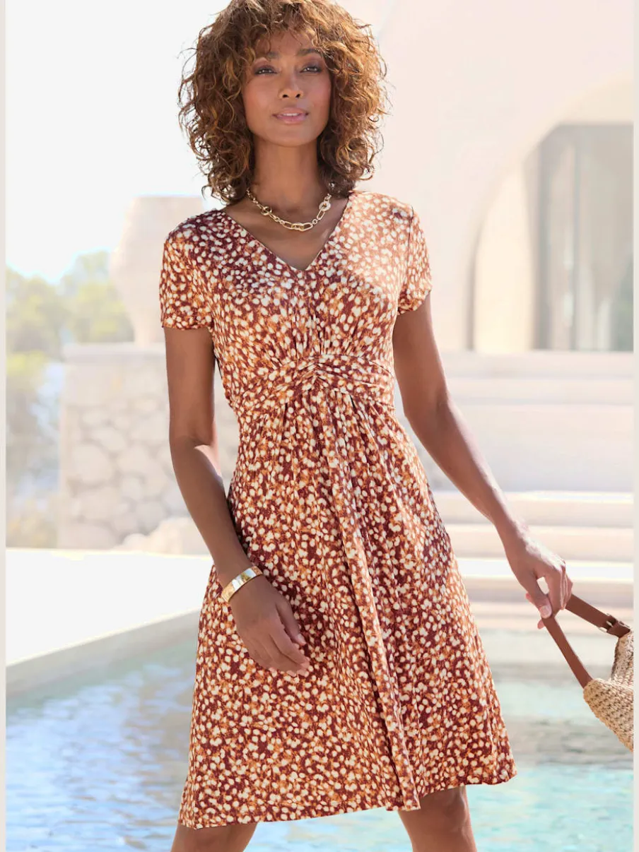 Robe jersey à encolure en V et fronces élégantes