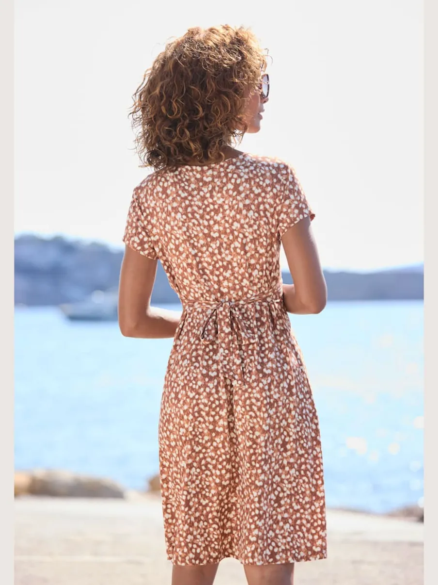 Robe jersey à encolure en V et fronces élégantes