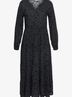 Robe longue avec encolure en v et manches longues élastiquées à motifs imprimés.