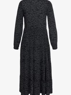 Robe longue avec encolure en v et manches longues élastiquées à motifs imprimés.