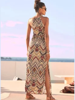 Robe longue à bretelles fines avec taille élastiquée et fentes