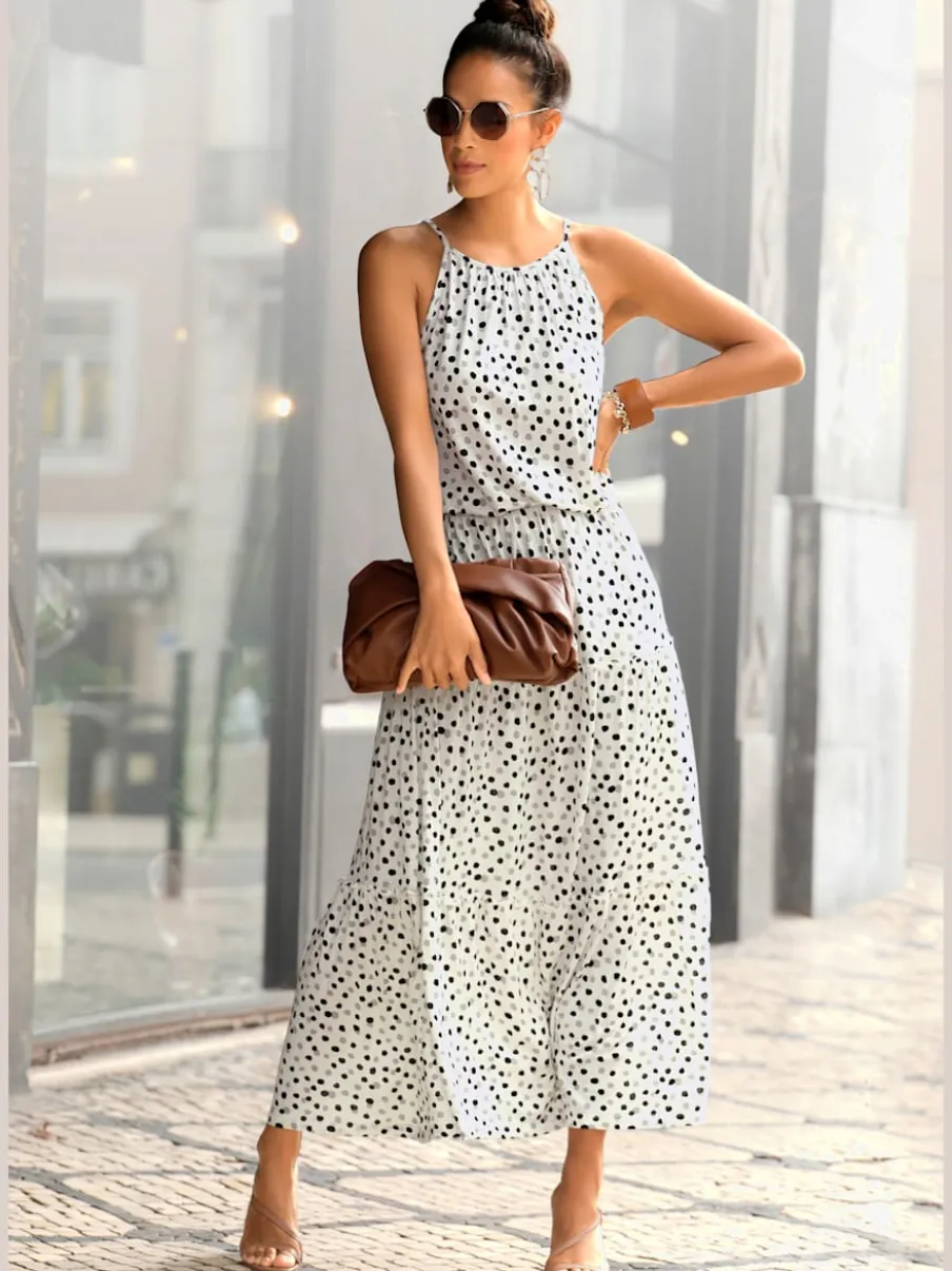 Robe longue fines bretelles spaghetti avec motifs à pois