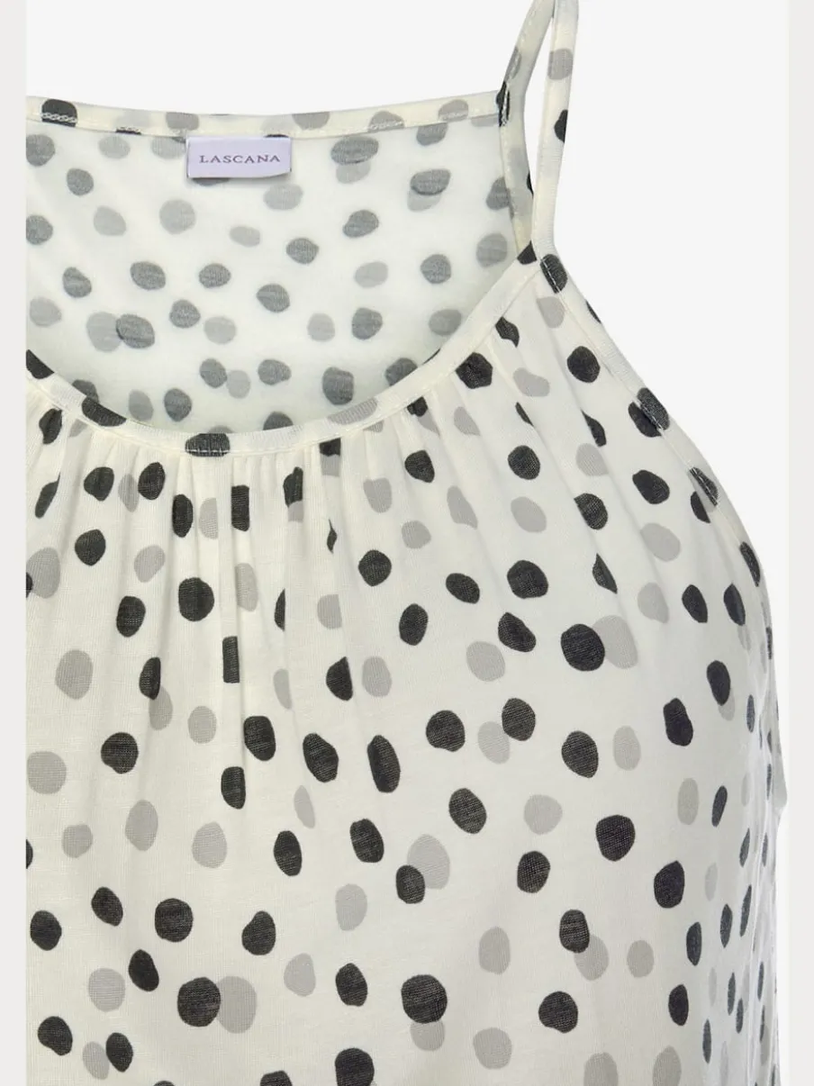 Robe longue fines bretelles spaghetti avec motifs à pois