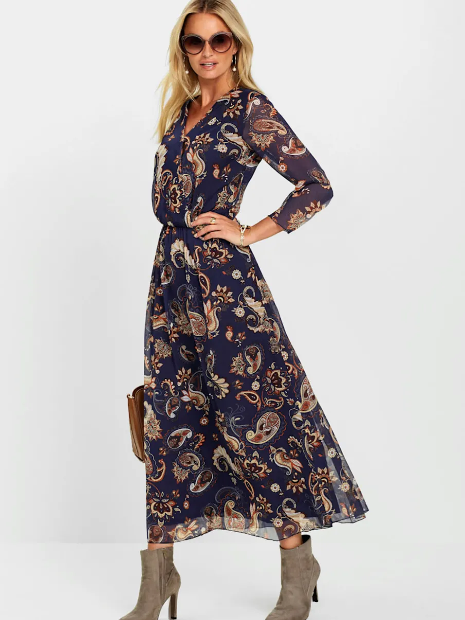 Robe longue fluide avec col en V et manches transparentes