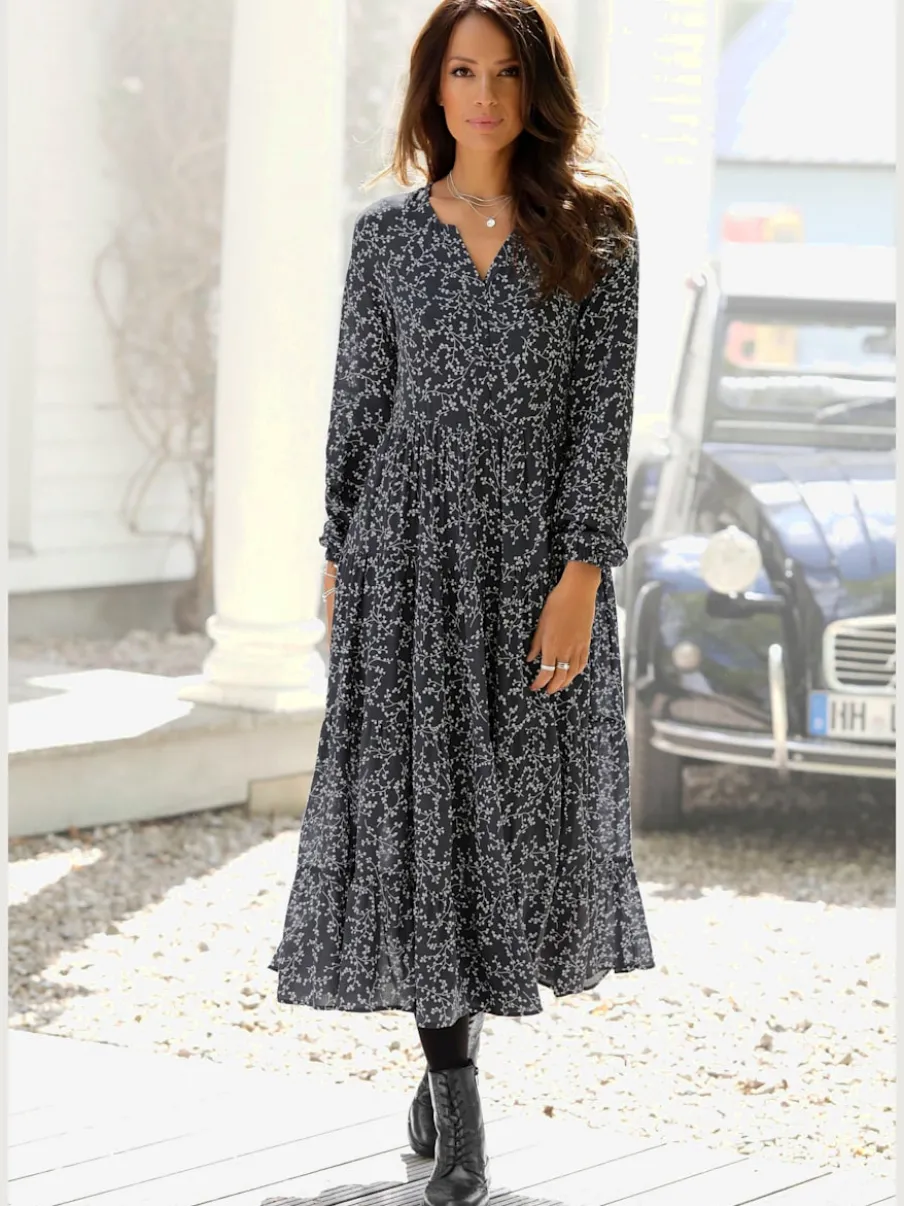 Robe longue à imprimé floral avec manches longues élastiquées et jupe évasée