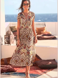 Robe mi-longue avec glissière dissimulée et manches courtes