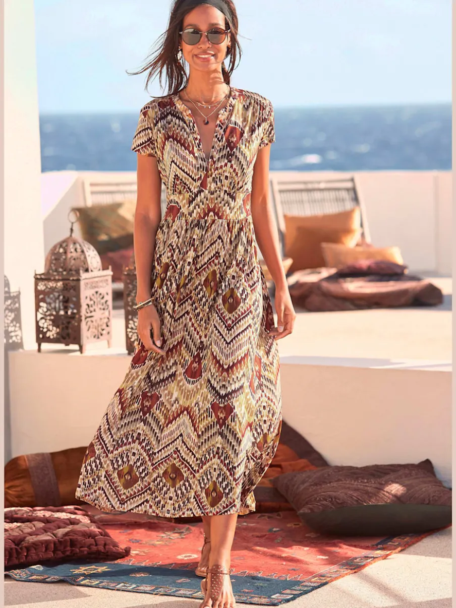 Robe mi-longue avec glissière dissimulée et manches courtes
