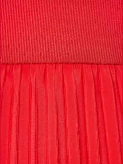 Robe mi-longue avec jupe plissée et col rond