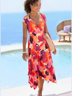 Robe mi-longue col chevauchant avec ceinture et ourlet asymétrique