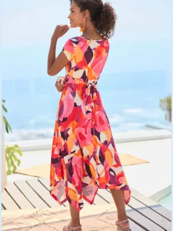 Robe mi-longue col chevauchant avec ceinture et ourlet asymétrique