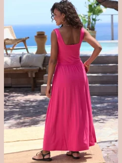 Robe mi-longue en jersey avec encolure droite et poches