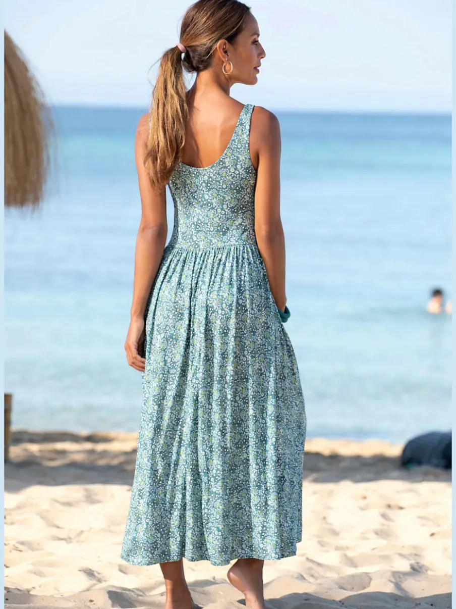Robe mi-longue à larges bretelles avec décolleté dos