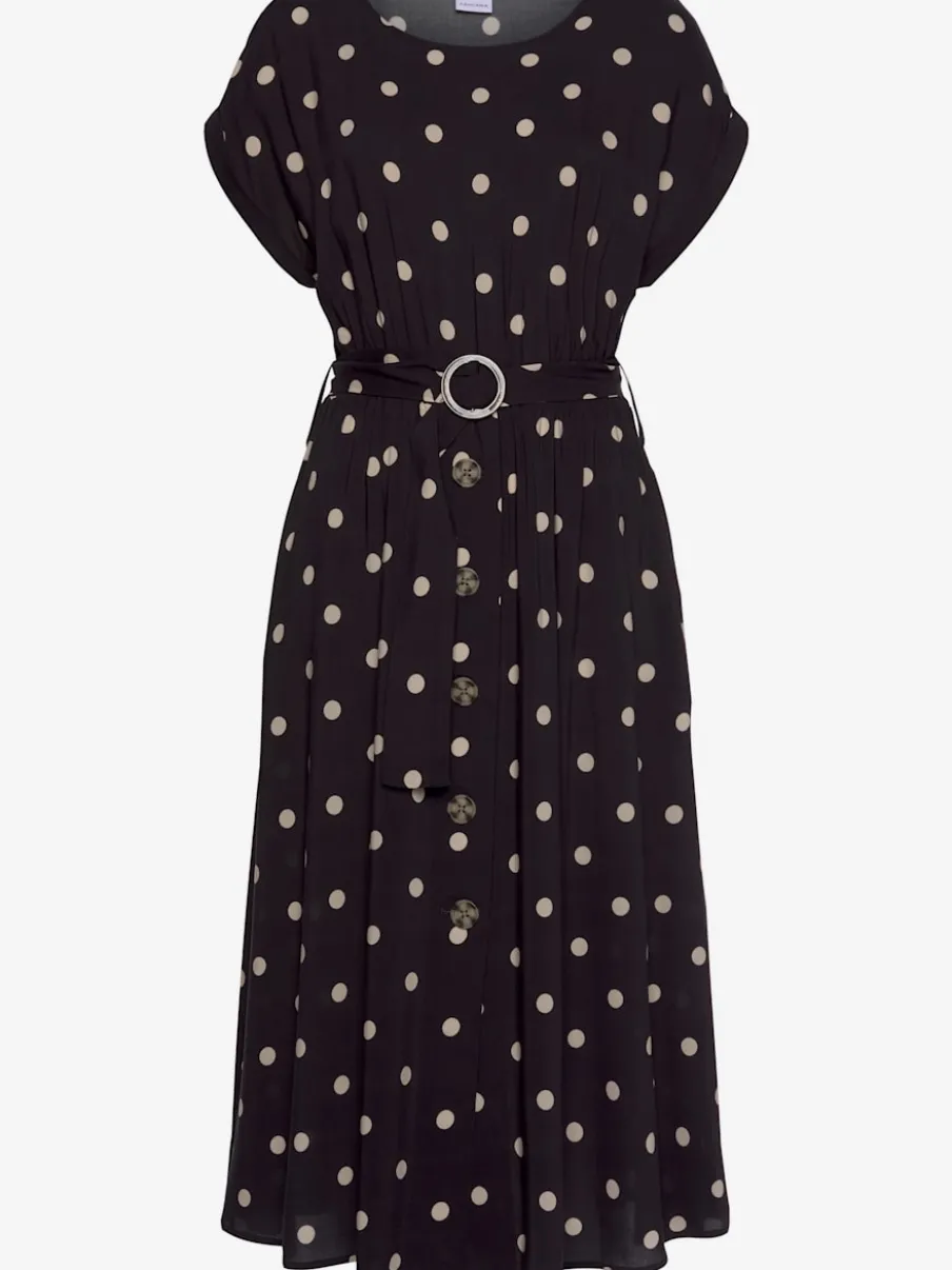 Robe mi-longue à pois avec ceinture et poches latérales