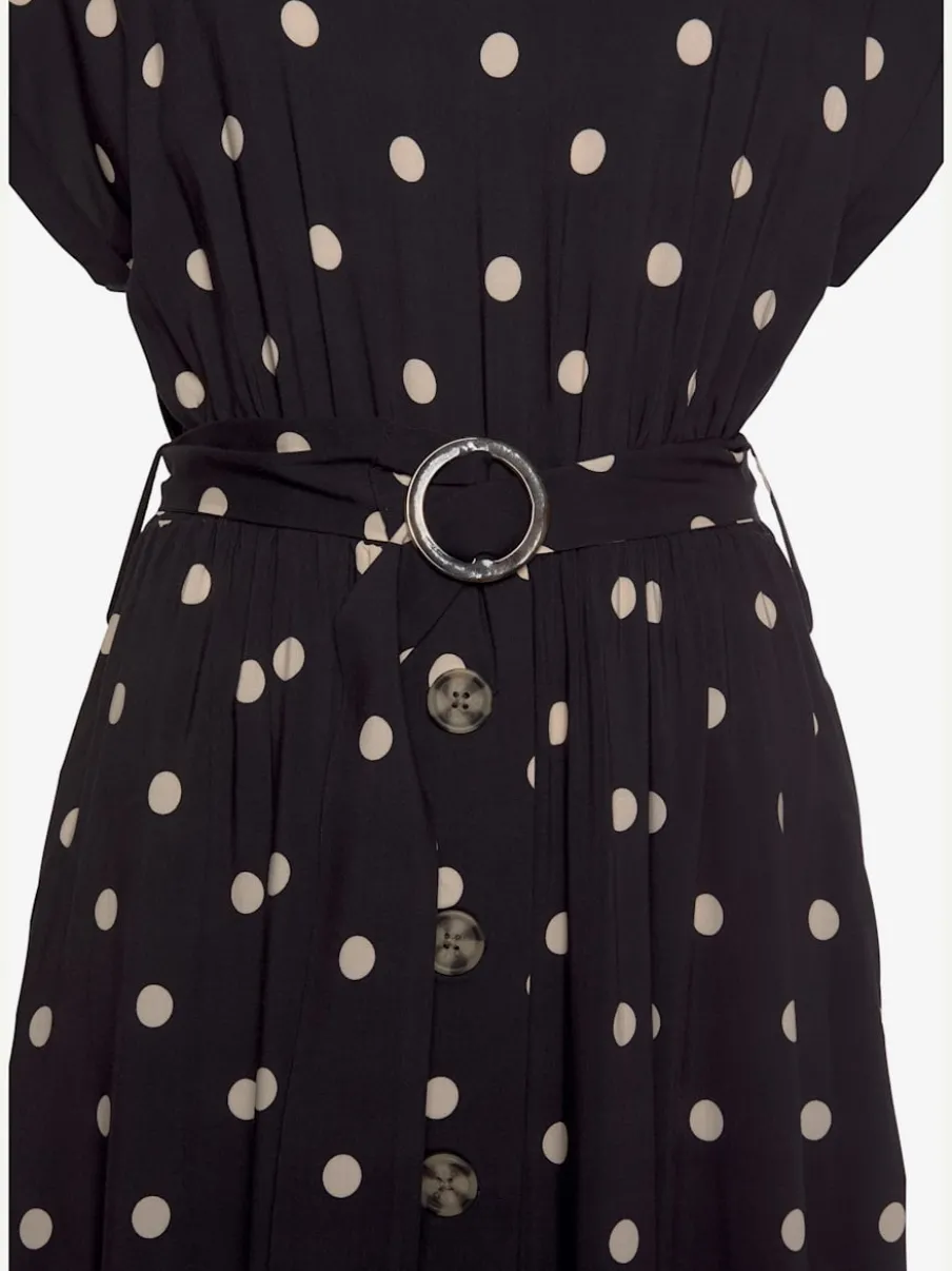 Robe mi-longue à pois avec ceinture et poches latérales