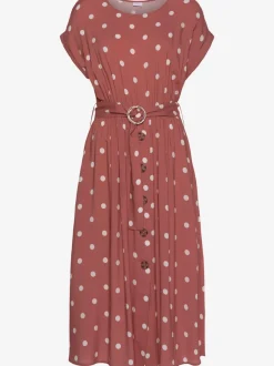 Robe mi-longue à pois avec ceinture et poches latérales