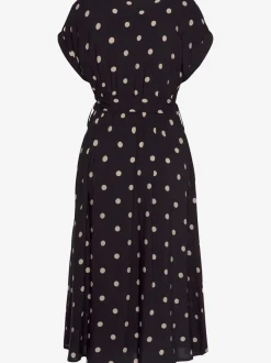 Robe mi-longue à pois avec ceinture et poches latérales