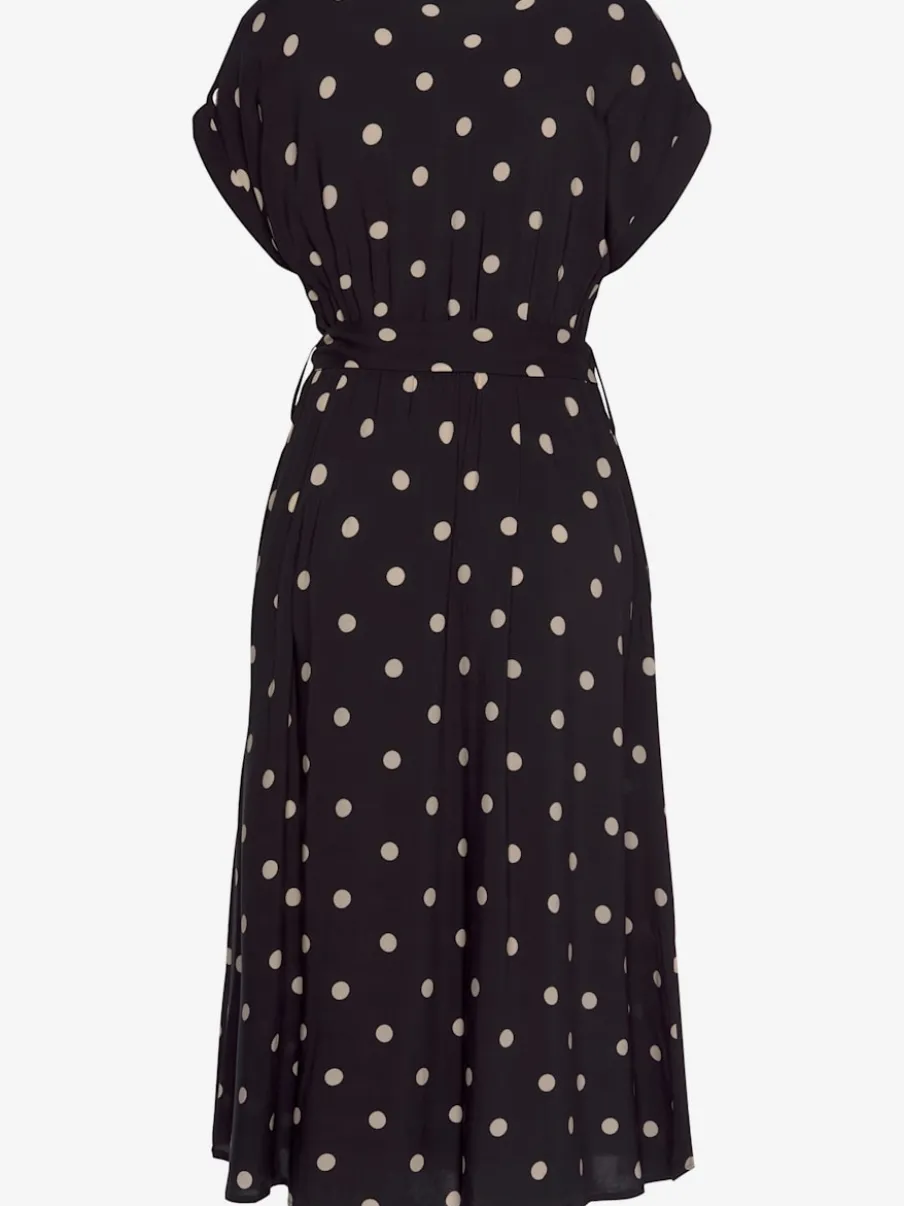 Robe mi-longue à pois avec ceinture et poches latérales