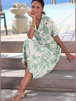 Robe mi-longue robe d'été à col tendance et encolure en v