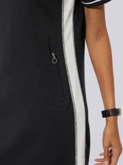 Robe polo avec col zippé et poches pratiques