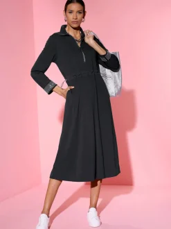 Robe polo en jersey avec col à zip et manches longues