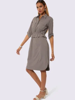 Robe polo à manches 3/4 avec poches et glissière