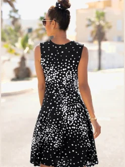Robe portefeuille à pois avec ceinture et manches sans manches