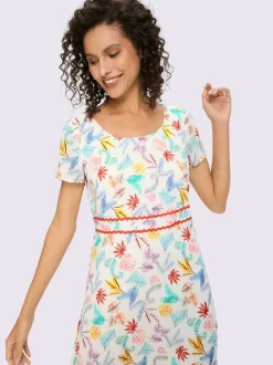 Robe tissée à encolure ronde et manches courtes avec motif feuilles artistiques
