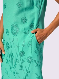 Robe tissée à encolure U avec broderie florale et poches latérales