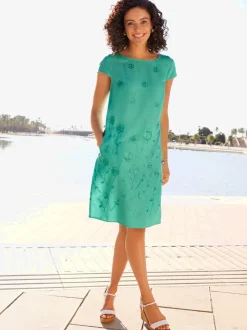 Robe tissée à encolure U avec broderie florale et poches latérales