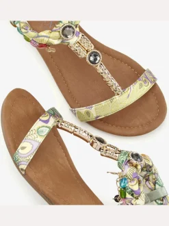 Sandales différents éléments décoratifs pour une allure, sophistiquée et raffinée