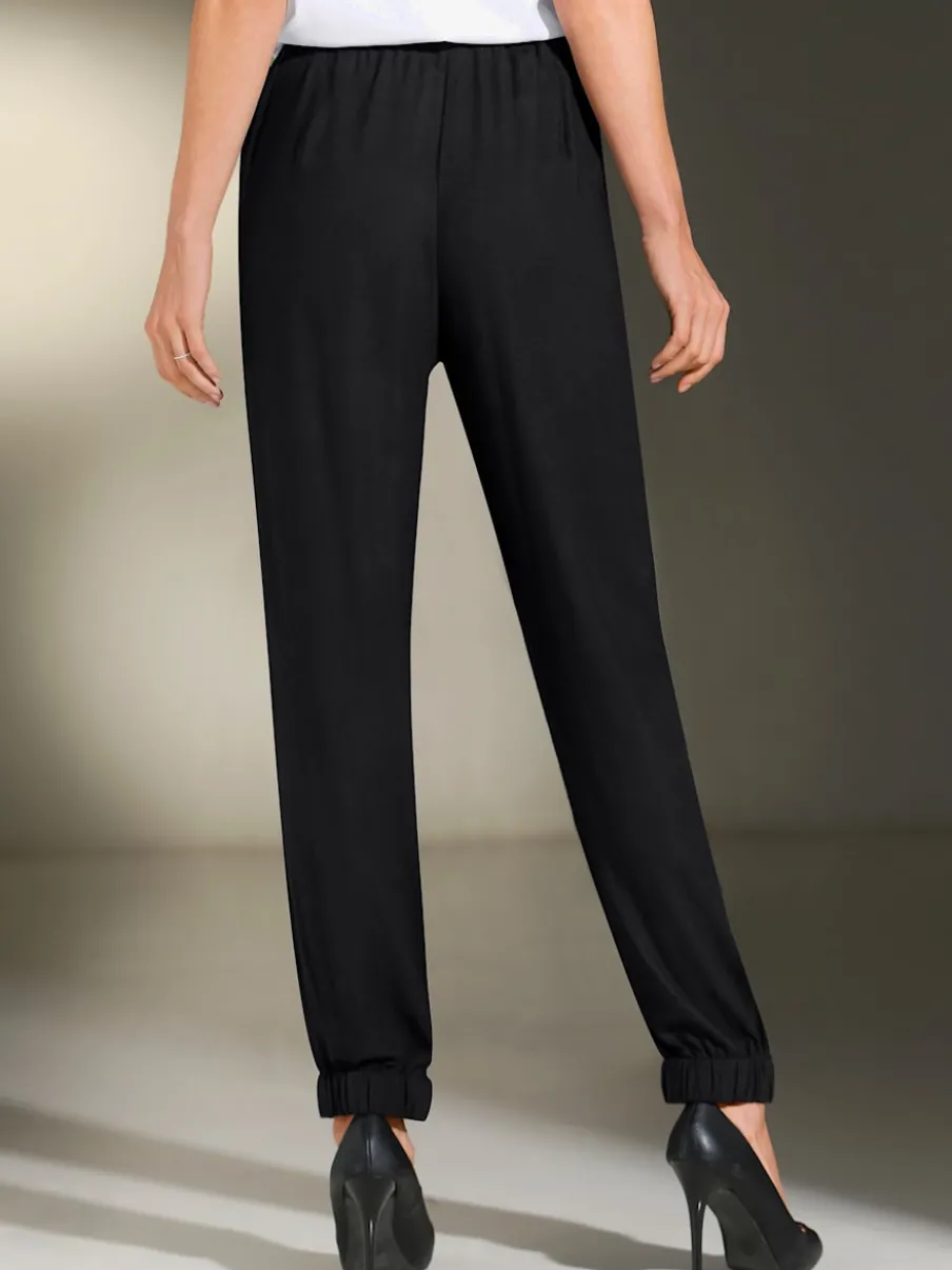 Sarouels fluides avec taille élastique et poches arrondies