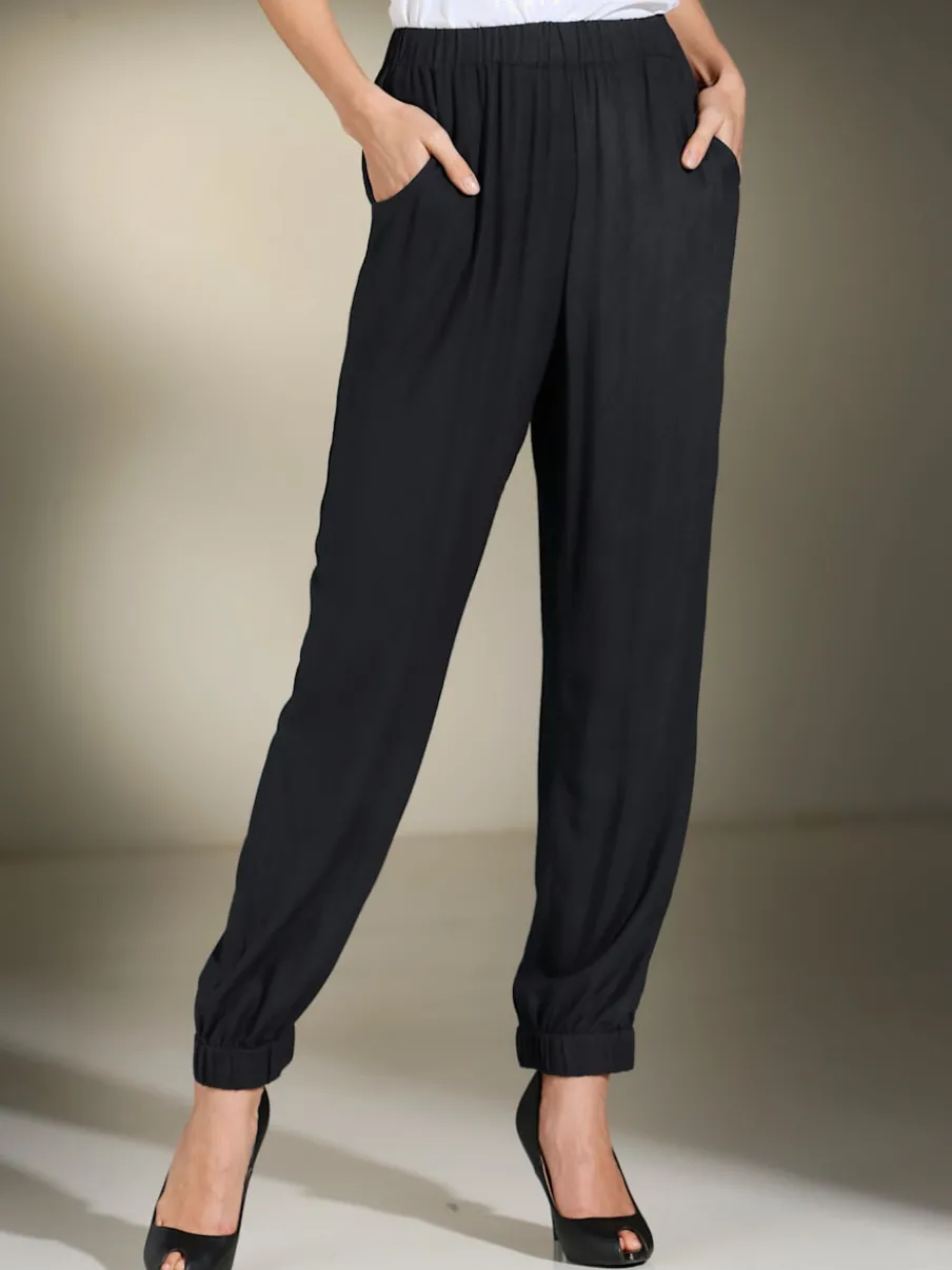 Sarouels fluides avec taille élastique et poches arrondies