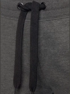 Short de détente sportif avec rayures latérales et ceinture à coulisse