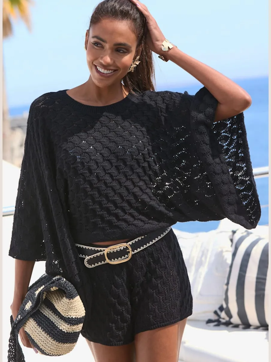 Short de plage en tricot à manches larges et motifs ajourés