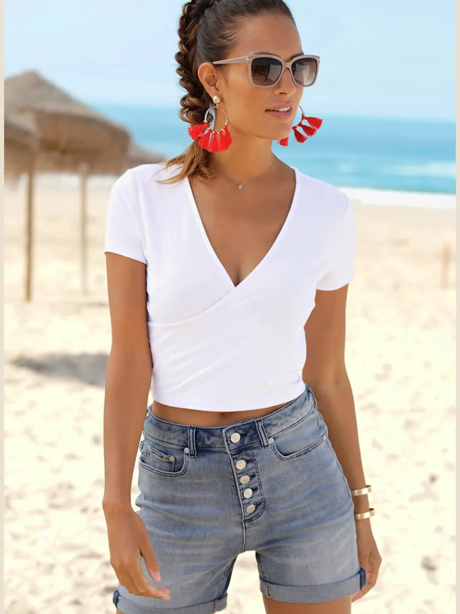 Short en jean taille haute avec patte de boutonnage et revers fixe