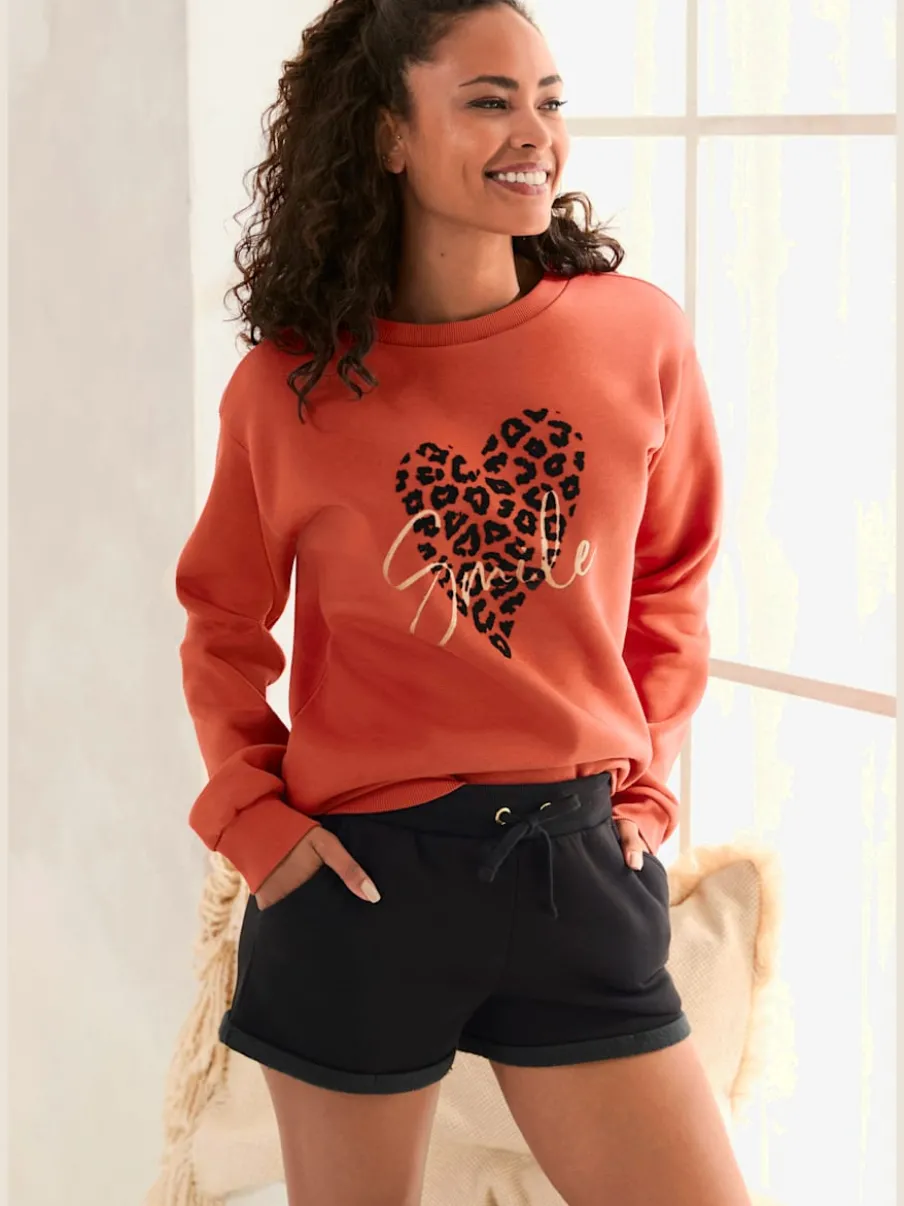 Short en matière sweat avec ceinture à coulisse et poches latérales