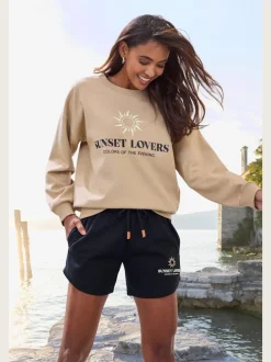 Short en matière sweat avec ceinture élastique et poches pratiques