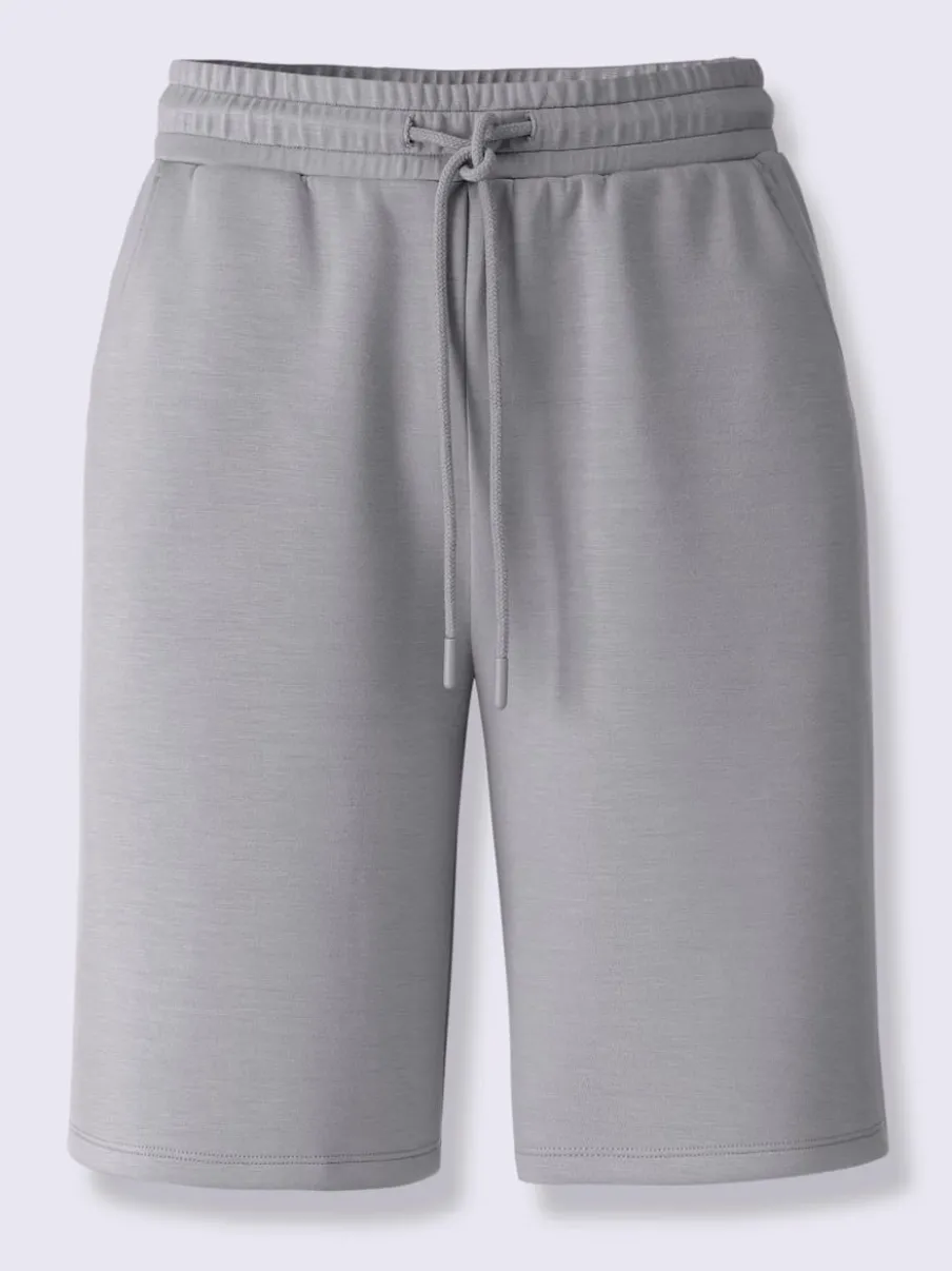Short sweat à ceinture élastique avec poches et lien à nouer