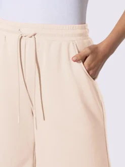 Short sweat à ceinture élastique avec poches et lien à nouer