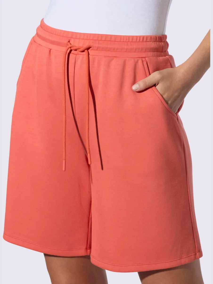 Short sweat à ceinture élastique avec poches et lien à nouer