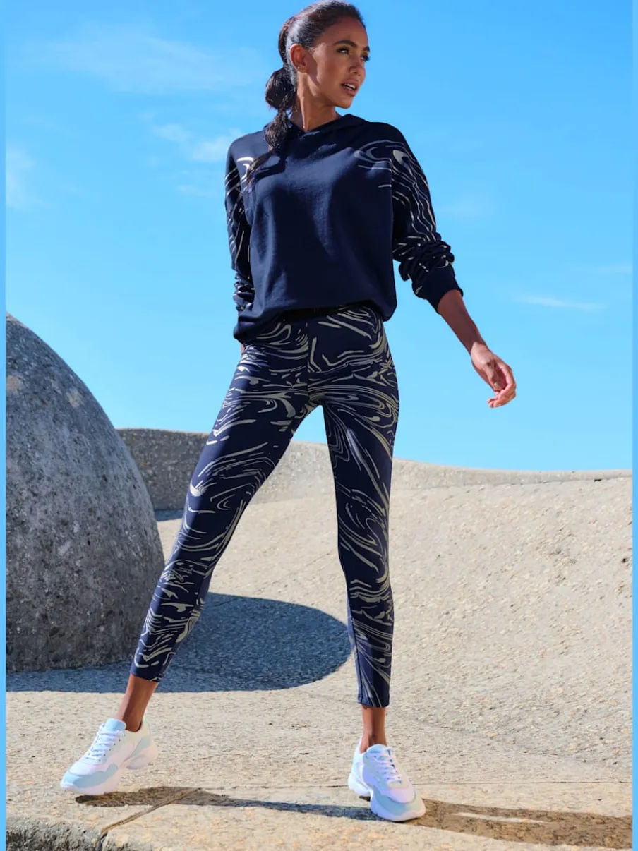 Sweat à capuche à motif abstrait avec bords-côtes doux