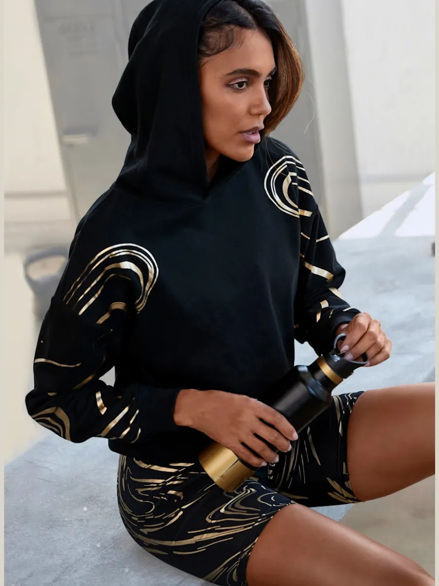 Sweat à capuche à motif abstrait avec bords-côtes doux