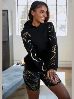 Sweat à capuche à motif abstrait avec bords-côtes doux